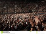 standing-ovation-enthusiastic-crowd-clapping-hands-concert-34040930.jpg