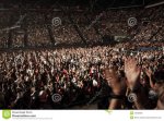 standing-ovation-enthusiastic-crowd-clapping-hands-concert-34040930.jpg